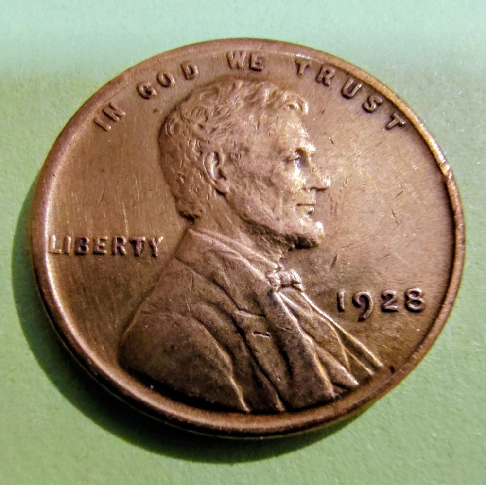 1928 Lincoln Wheat Penny 1-Cent In Good Circulated Condition. Item #5057